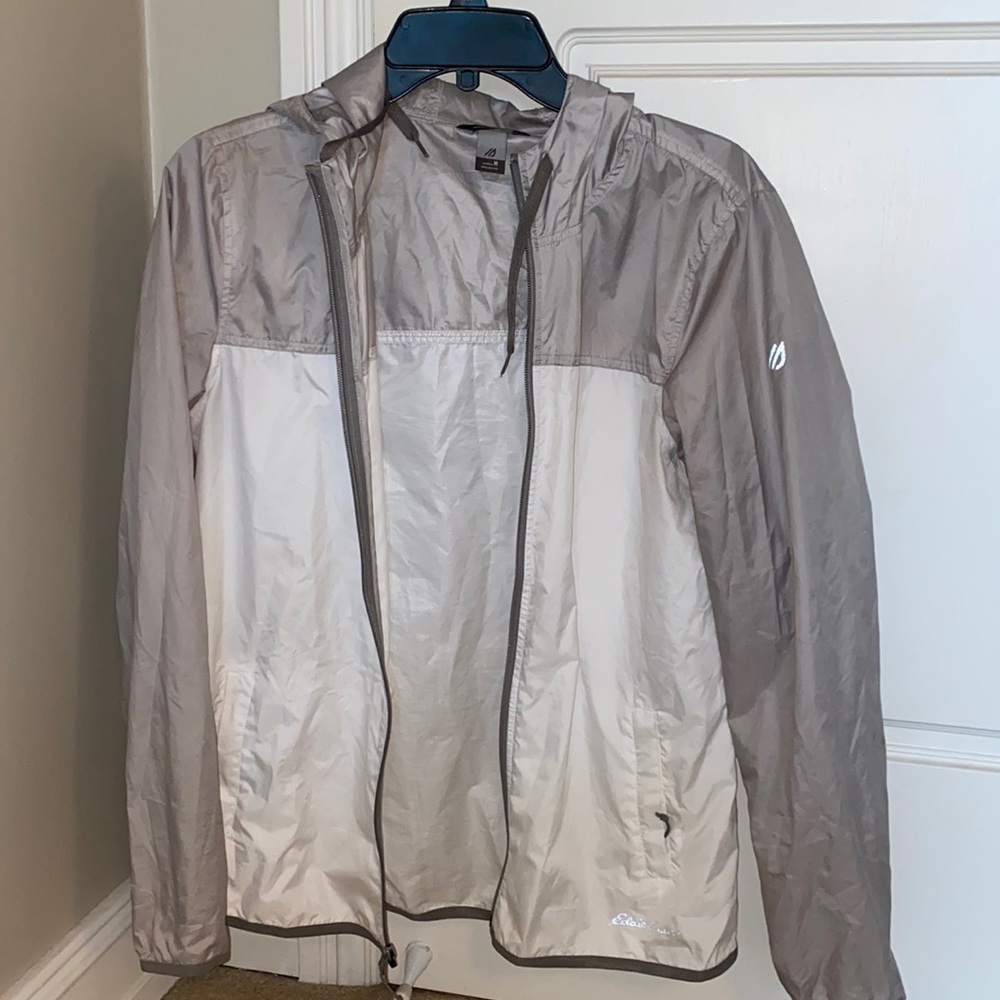 grey and white eddie bauer wind breaker